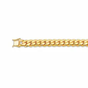 Gold Cuban link bracelet on white background