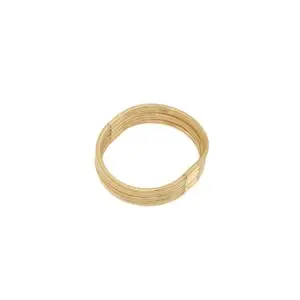Gold-colored coiled metal wire on white