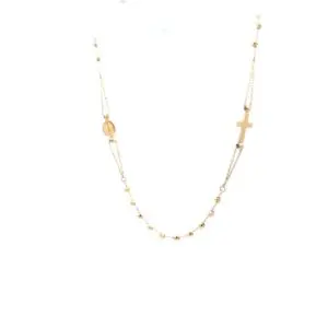 Delicate gold necklace with cross and medallion