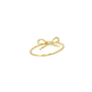 Delicate gold bow ring on white background