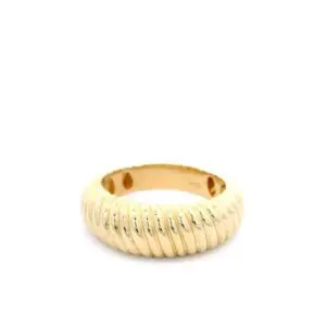 Gold ribbed dome ring on white background