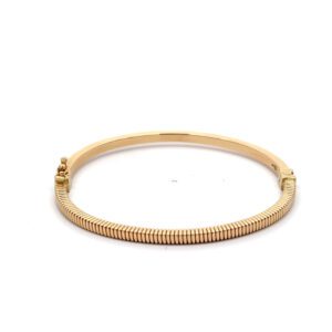 Gold ribbed bangle bracelet with clasp