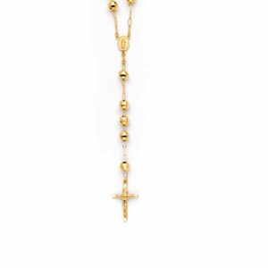 Gold rosary beads with crucifix on white