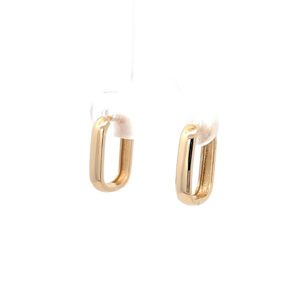 Gold rectangular hoop earrings on white display
